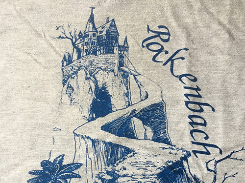 Exponierte Burg und Weg dorthin mit dem Text "Rockenbach"